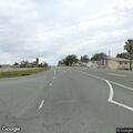 Pedestrian walking in traffic on Highway 49
