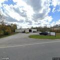 Open overhead door at empty business reported