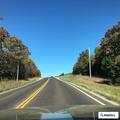 Motorcycle crash off highway injures rider