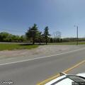 Pickup truck stops after following ambulance with siren