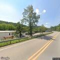 Stuck truck blocking roadway on Alternate Route 10