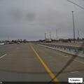 Vehicles assisting disabled car on I-65 exit