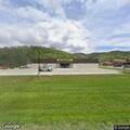 Intoxicated driver in parked sedan at Dollar General
