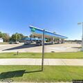 Suspicious person checking car doors near gas station