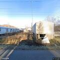 Person banging on trailer window in Milton