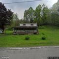 Report of people inside vacant Gauley River home