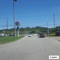 Officer reports resisting person at gas station
