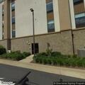 Person staying in Hampton Inn lobby bathroom