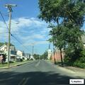 Person experiencing chest pain near Main Street and Church Street