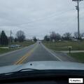 Officer serving legal papers in Haysville