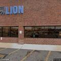 Strange behavior reported of man in green sedan at parking lot