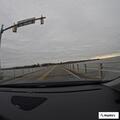 Truck reportedly sideswipes vehicle on bridge