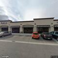 Dog left in minivan behind fitness center