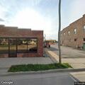 Homeless person removed from back of building