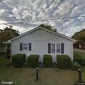 Attempted paper service at Bluegrass Street home