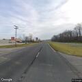 Two-vehicle crash with smoke and three people hurt