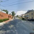 Patient with severe back pain at Delaware Avenue
