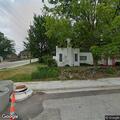 Female lying in roadway near Walnut Street