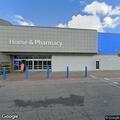 Man loitering between cars at Paola Walmart