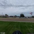 Small bonfire behind church reported