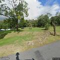 Report of large fire behind house without permit