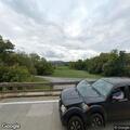 Person unconscious with unknown breathing near River Road