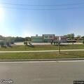 Suspicious vehicle at discount store parking lot