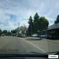 Person on bicycle acting erratically behind 7-Eleven