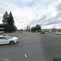 Officers check blue Subaru Impreza at intersection