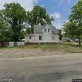 Suspicious person behind vacant house on Locust