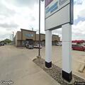 Driver hits Discount Tobacco building and flees