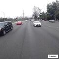 Reckless red pickup reported on Sunrise Boulevard