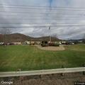 Female choking on water during alcohol detox at Gallia Pike