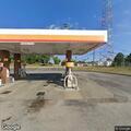 Man appearing about to faint at gas station