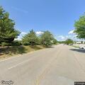 Large tree branch blocking road at Potomac Mills