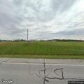 Officer stops burgundy Lincoln driving erratically