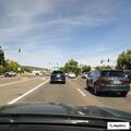 UPS truck stuck blocking turn lane at intersection