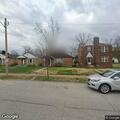 Dumpster pulled down power line behind Etzel Avenue home