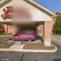 Person with back pain at hotel on McBride and Son Center Dr
