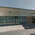 Officer checks person at Sherwin-Williams store