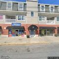 Person with headache at laundry mat on North Race Street