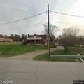 Utility lines down across driveway at home