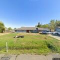 Welfare check at residence with garage door open