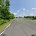 Two-car crash with shoulder injury at intersection