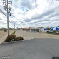 Two vehicles collide in parking lot at business