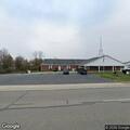 Officer checks on truck at church parking area