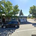 Intoxicated man lying outside liquor store