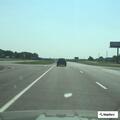 Pickup truck out of gas on highway shoulder