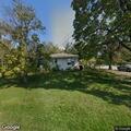 Tree branch on utility line at Olive Street home