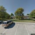 Suspicious person knocking on apartment door